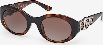 Lunettes de soleil GUESS en marron : devant