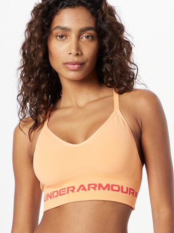 Bustier Soutien-gorge de sport UNDER ARMOUR en orange : devant