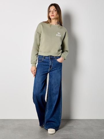 Sweat-shirt 'Dancing Queen' Apricot en vert