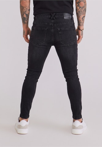 Slimfit Jeans di SikSilk in nero