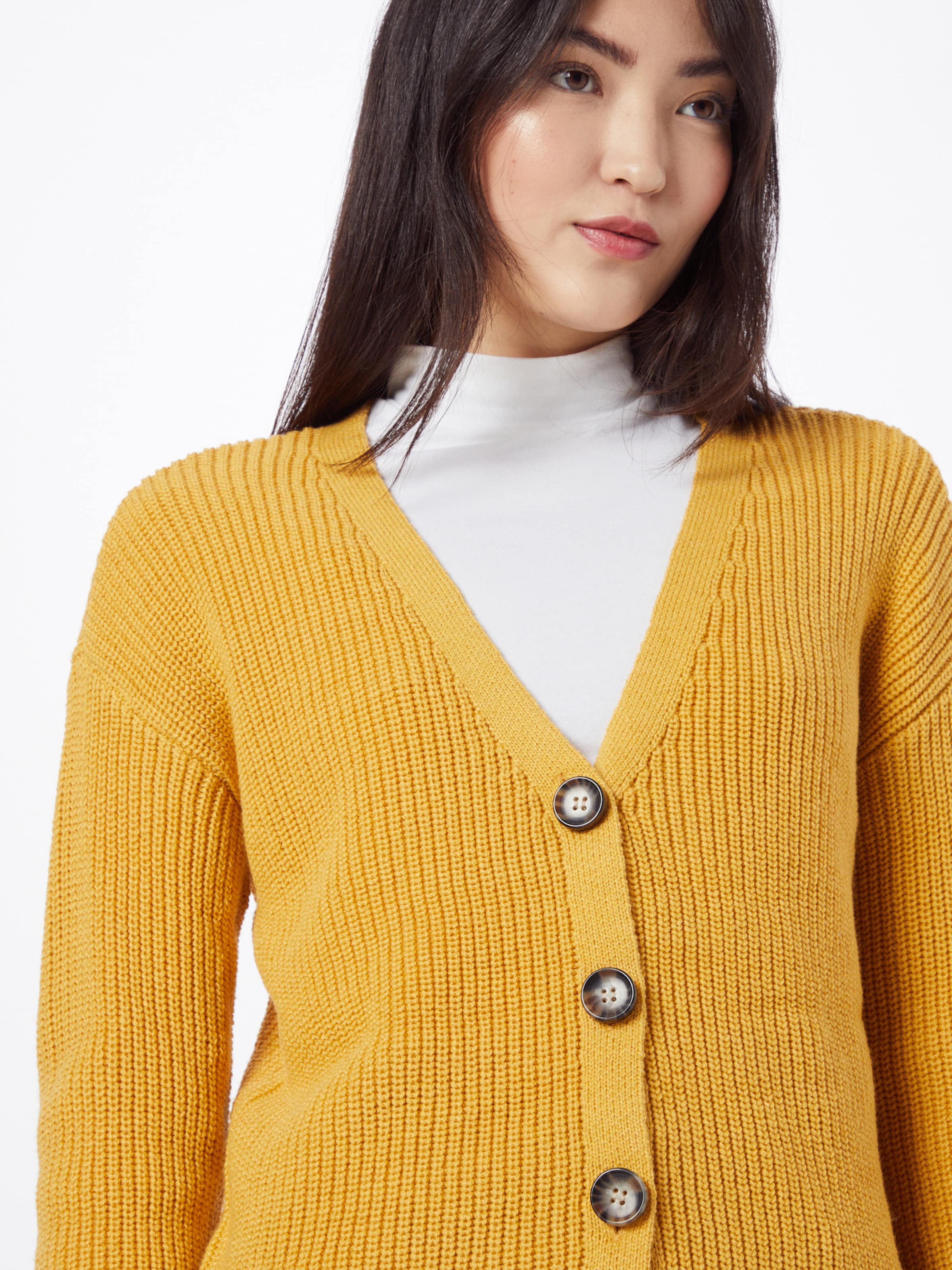 yellow knit cardigan