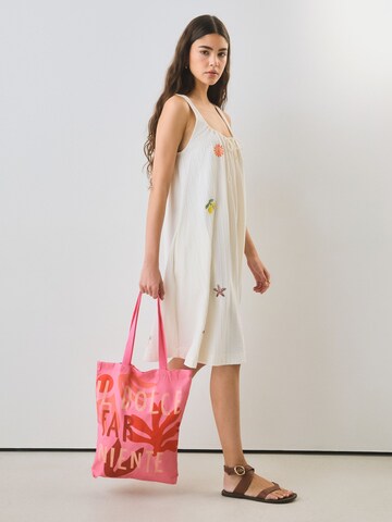 Next Shopper in Pink