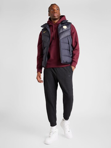 Effilé Pantalon de sport NIKE en noir