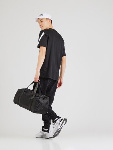 ADIDAS SPORTSWEAR Tapered Sports trousers in Black