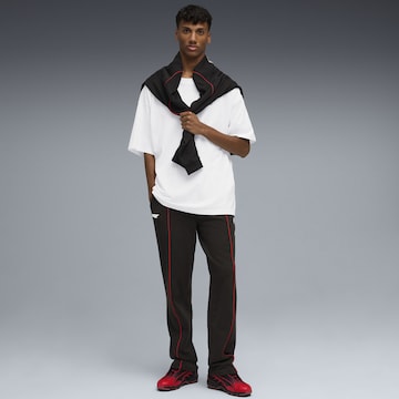 PUMA Regular Sporthose 'F1' in Schwarz