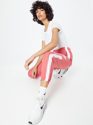 Nike Sportswear Tapered Hose in Pink