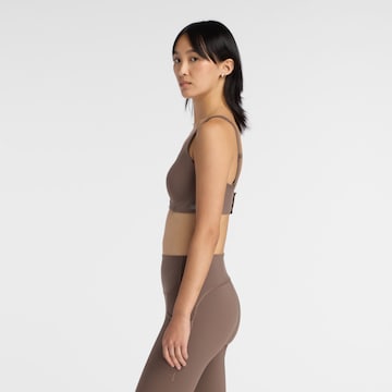 new balance - Soutien Bustier Soutien de desporto em castanho