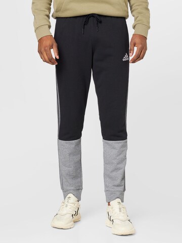 Tapered Pantaloni sportivi 'Essentials Mélange French Terry' di ADIDAS SPORTSWEAR in nero: frontale