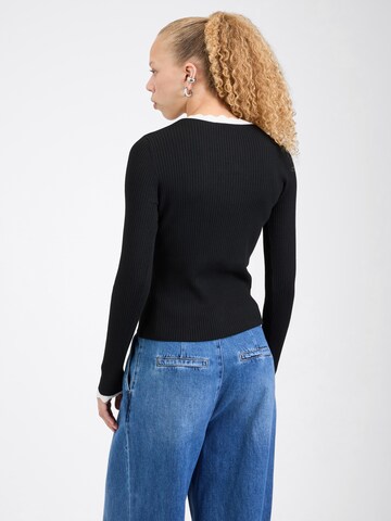 Pull-over 'Inge' ABOUT YOU en noir
