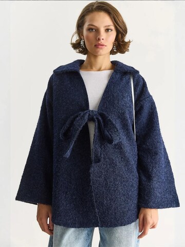 Cardigan Bianco Lucci en bleu