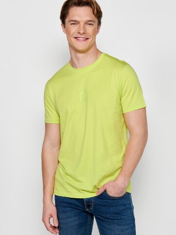 Tricou de la KOROSHI pe verde: față