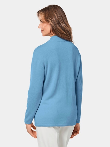 Goldner Pullover in Blau