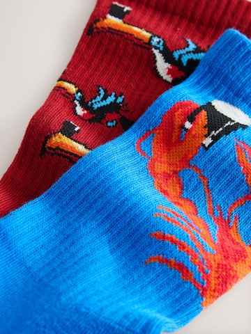 Șosete 'Guinness Licence' de la Next pe roșu