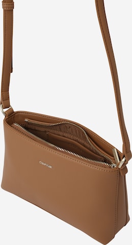 Calvin Klein Crossbody Bag 'Must' in Brown