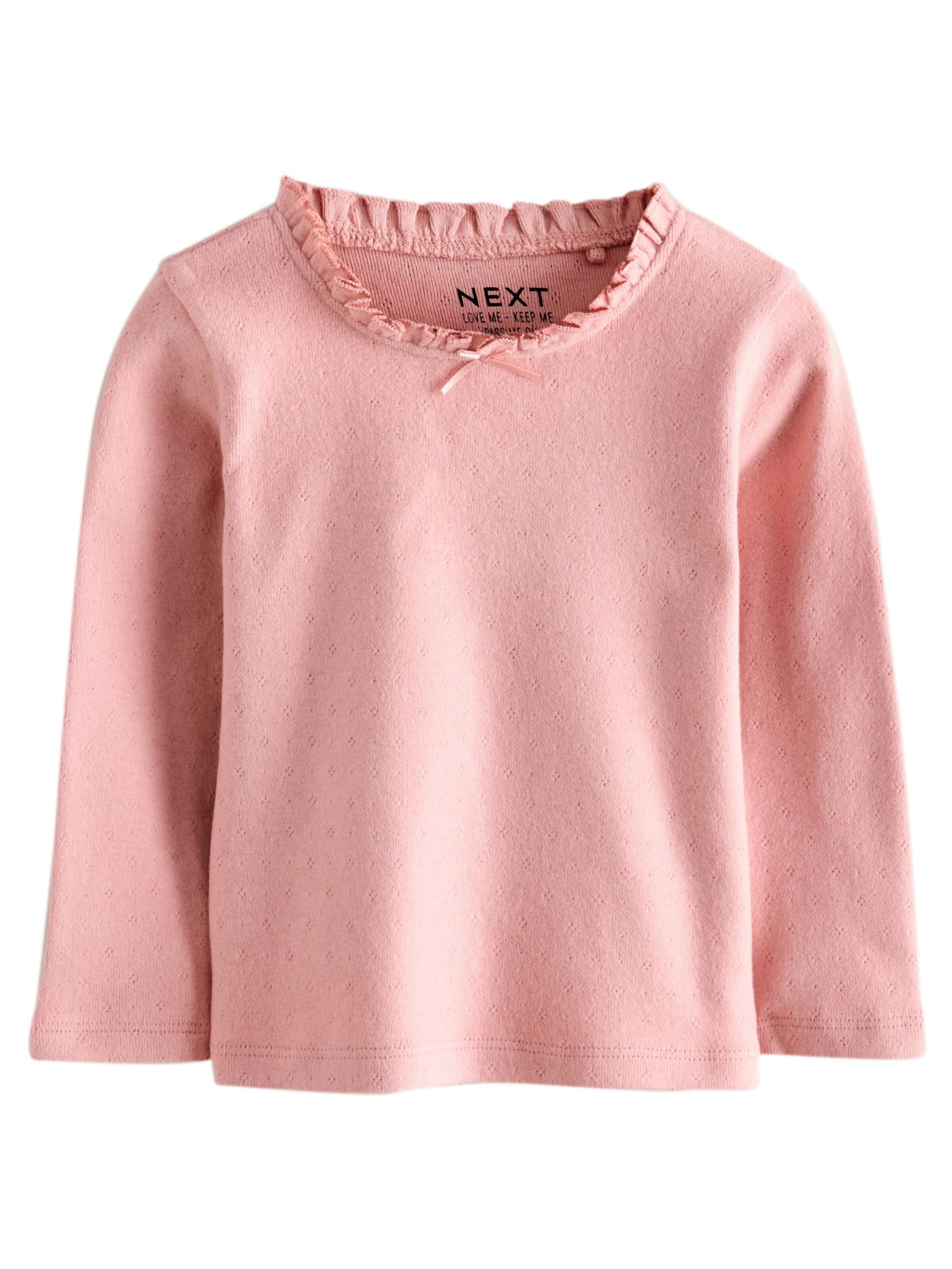 Tricou de la Next pe bej