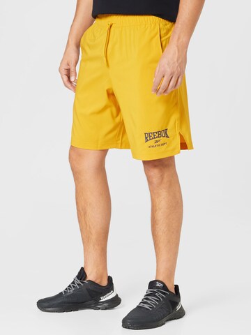 Reebok Normální Sportovní kalhoty – žlutá: přední strana