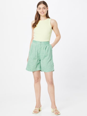 Wide leg Pantaloni cutați de la TOMMY HILFIGER pe verde