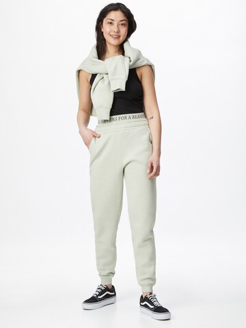 ABOUT YOU Limited Tapered Trousers 'Anna' in Green