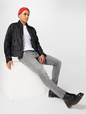 DIESEL Slimfit Jeans 'LUSTER' in Grau