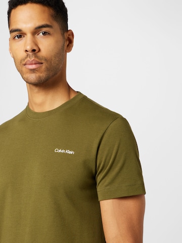 Calvin Klein قميص بلون أخضر