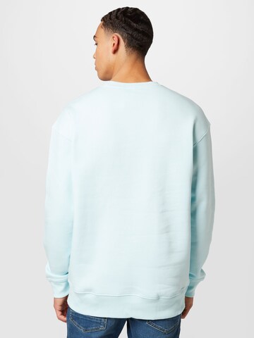 ADIDAS SPORTSWEAR Sports sweatshirt 'Essentials Feelvivid  Fleece Drop Shoulder' in Blue