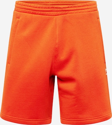 Pantalon 'Trefoil Essentials' ADIDAS ORIGINALS en rouge : devant
