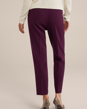 Slimfit Pantaloni con piega frontale di WE Fashion in rosso