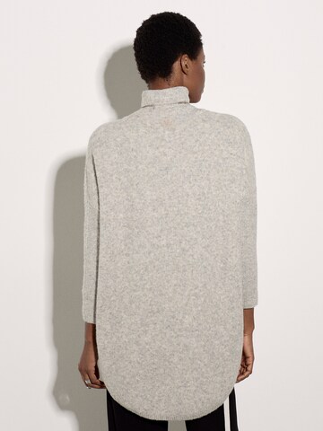 Pull-over ' Rollkragen-Cape ' Apricot en gris