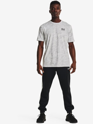 T-Shirt fonctionnel UNDER ARMOUR en blanc