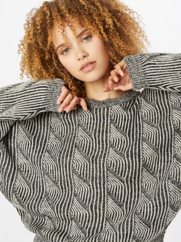 Pull-over Sisley en gris