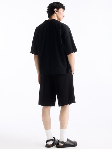 Loosefit Pantaloni con pieghe di Pull&Bear in nero