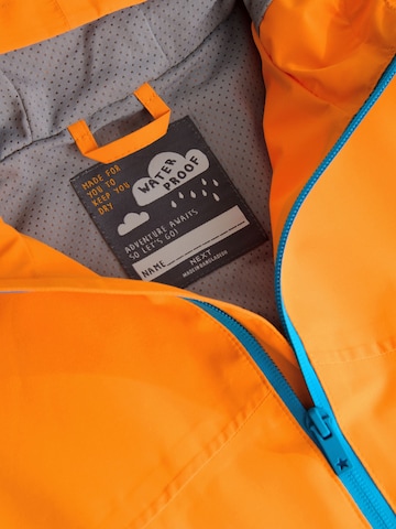 NextPrijelazna jakna - narančasta boja