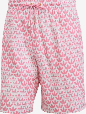 ADIDAS ORIGINALS regular Bukser 'Graphics Monogram Allover Print' i pink: forside