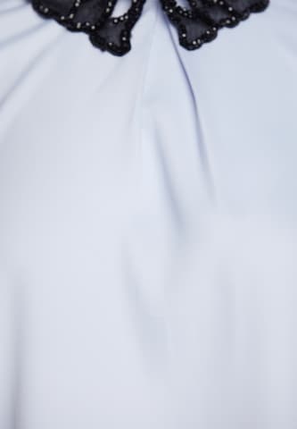 faina - Blusa 'GLOW' en azul