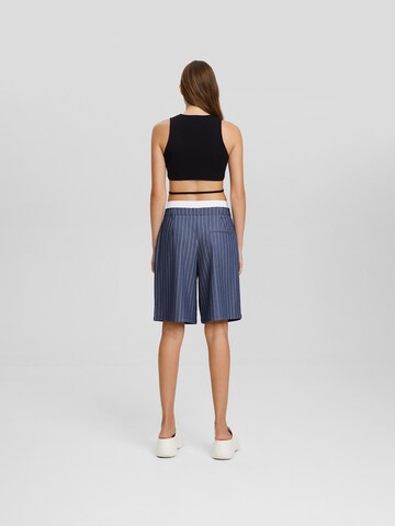 Bershka Loose fit Pleat-Front Pants in Blue