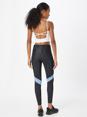 Onzie Skinny Sportbroek 'Cadence' in Zwart