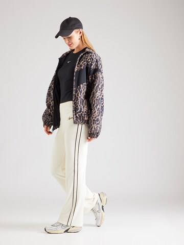 Nike Sportswear Lużny krój Spodnie w kolorze biały