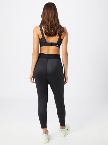 Athlecia Tapered Sportbroek 'Beastown' in Zwart