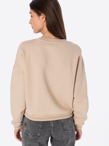 GUESSSweater majica 'ROXI' - bež boja
