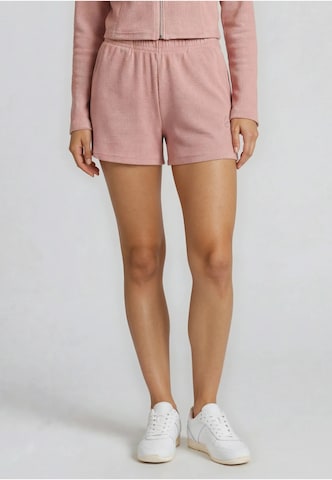 Regular Pantalon Karl Kani en rose : devant