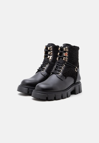 Love Moschino Paeltega poolsaabas, värv must