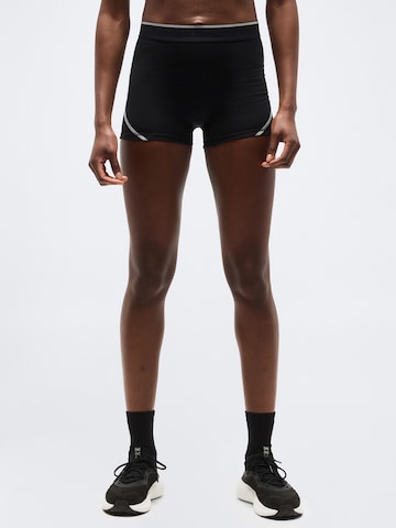 Skinny Pantalon de sport 'Elite' UNDER ARMOUR en noir : devant