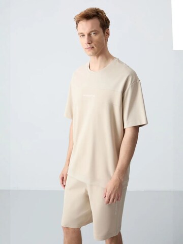 Tuta da jogging di Tommy Life in beige
