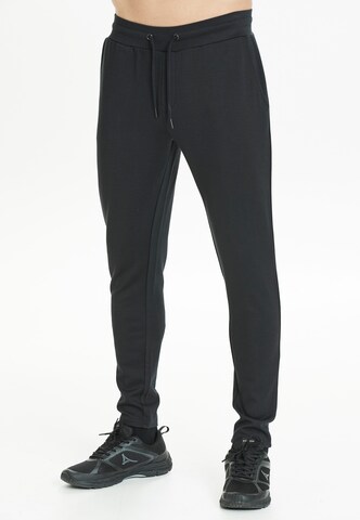 Virtus Tapered Pants 'ODETTA' in Black: front