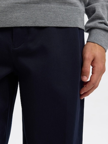 SELECTED - Loosefit Pantalón de pinzas en azul