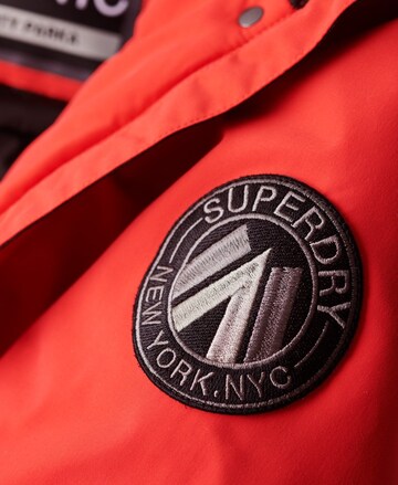 Parka mi-saison Superdry en rouge