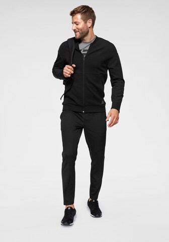 Reebok Tapered Trainingshose in Schwarz