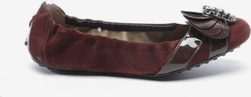 Tod's Flats & Loafers in 37 in Brown: front