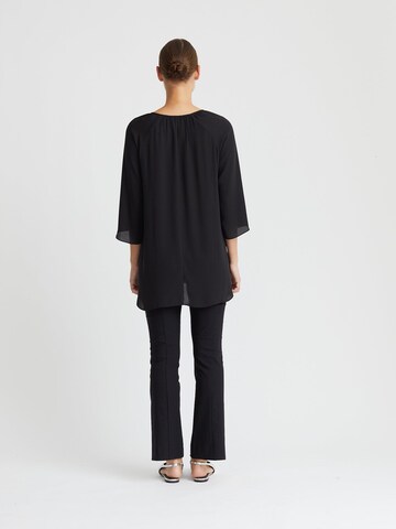 Minx Bluse‌‌‌‌‌‌‌‌‌ in Schwarz