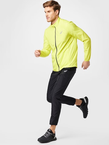 ASICS - Chaqueta deportiva en amarillo